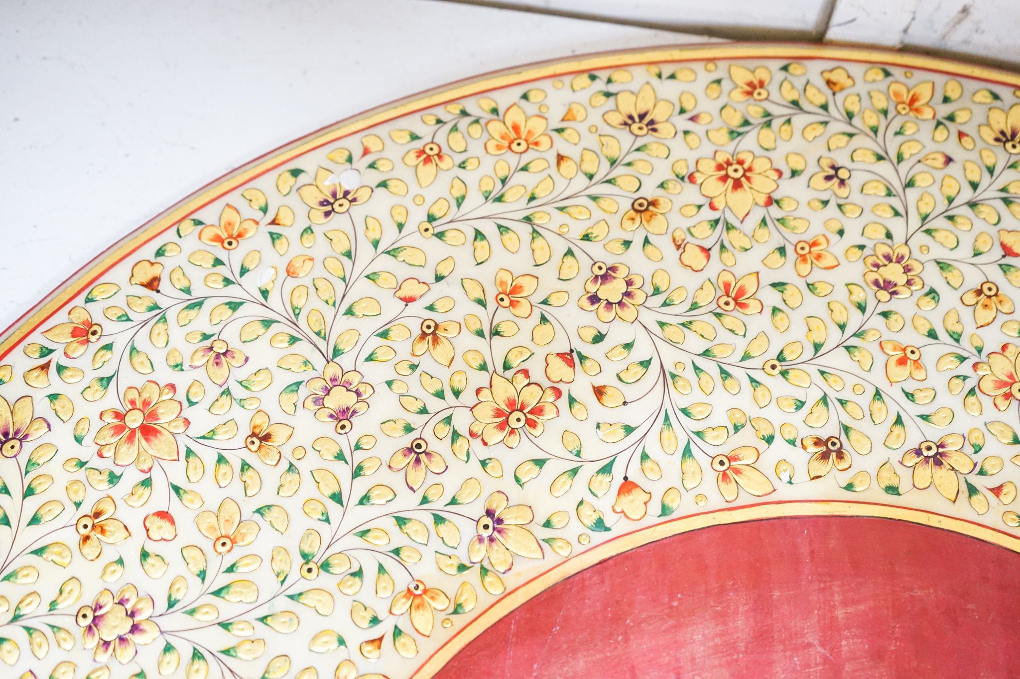 An Indian Kashmiri painted alabaster table top 76cm
